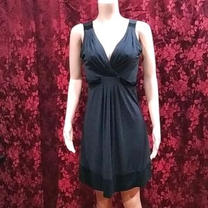 BCBG MAXAZRIA black petites sleeveless mini dress.